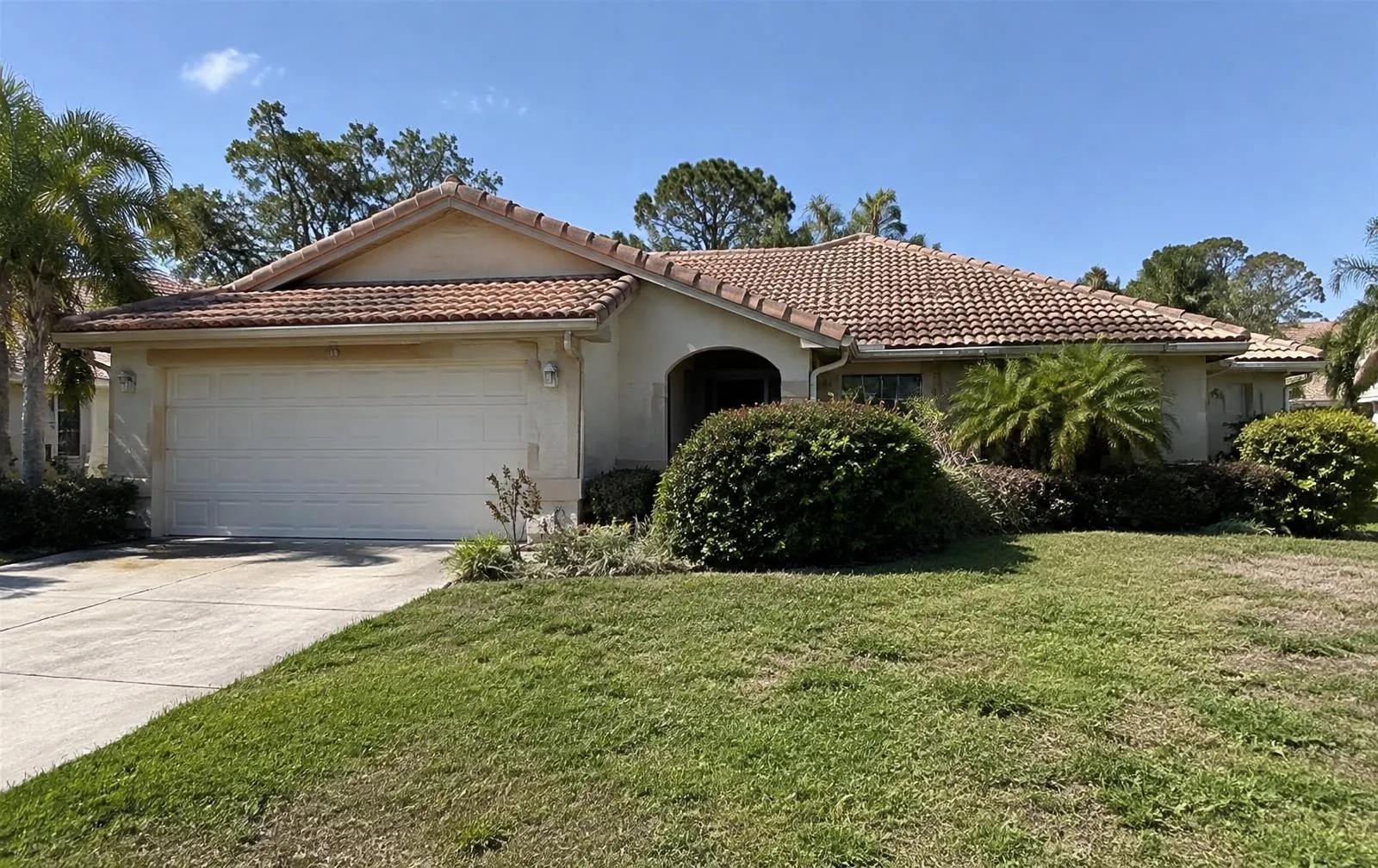 Older single-family Florida stucco home